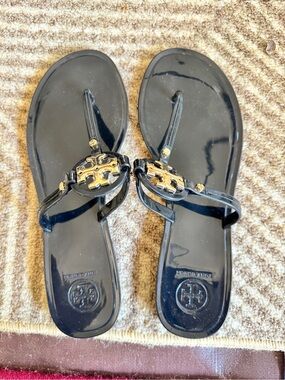 Tory Burch Black Jelly Logo Thong Sandals with Gold Emblem
